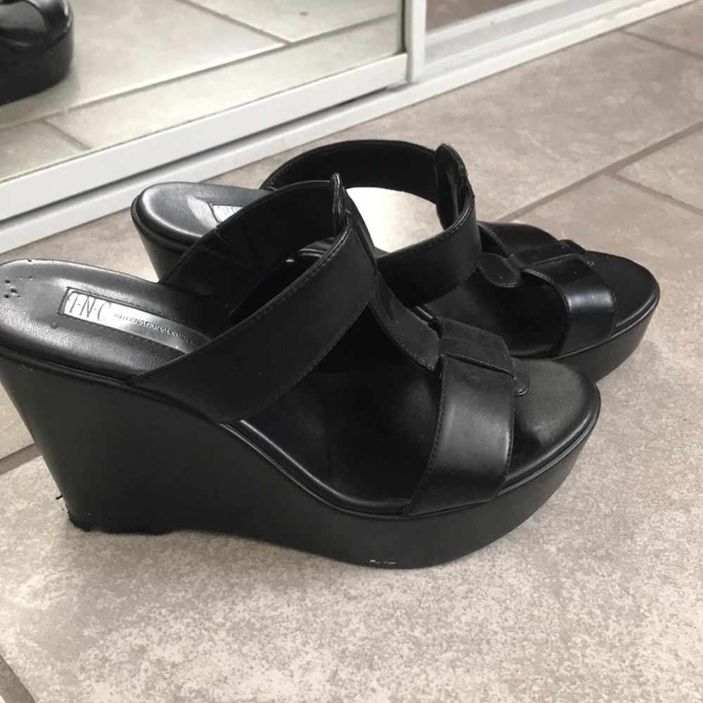 Woman’s black wedges